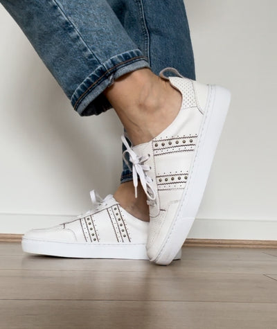 white sneakers with stud detail