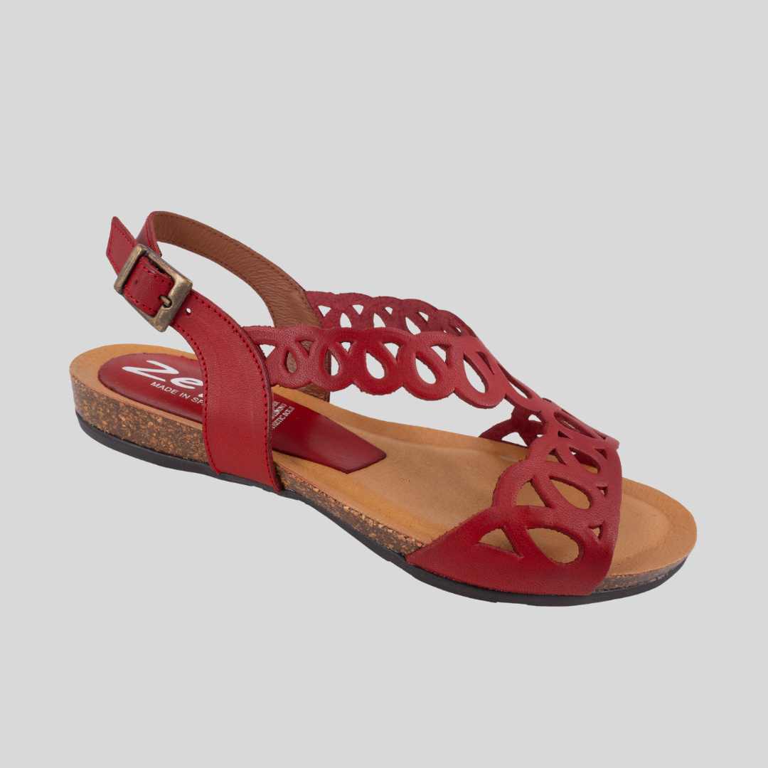 Red leather sandals with a buskle adjustment at the heel