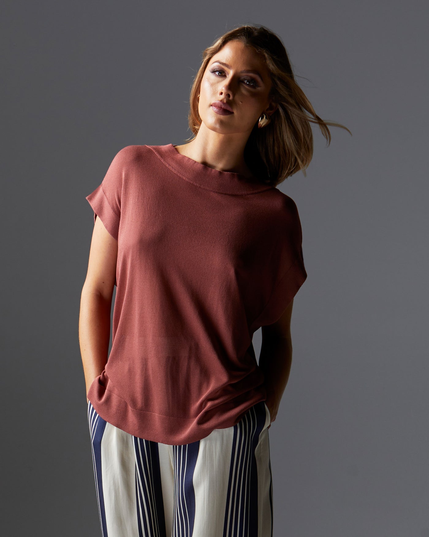 cinnamon colour top with high neck