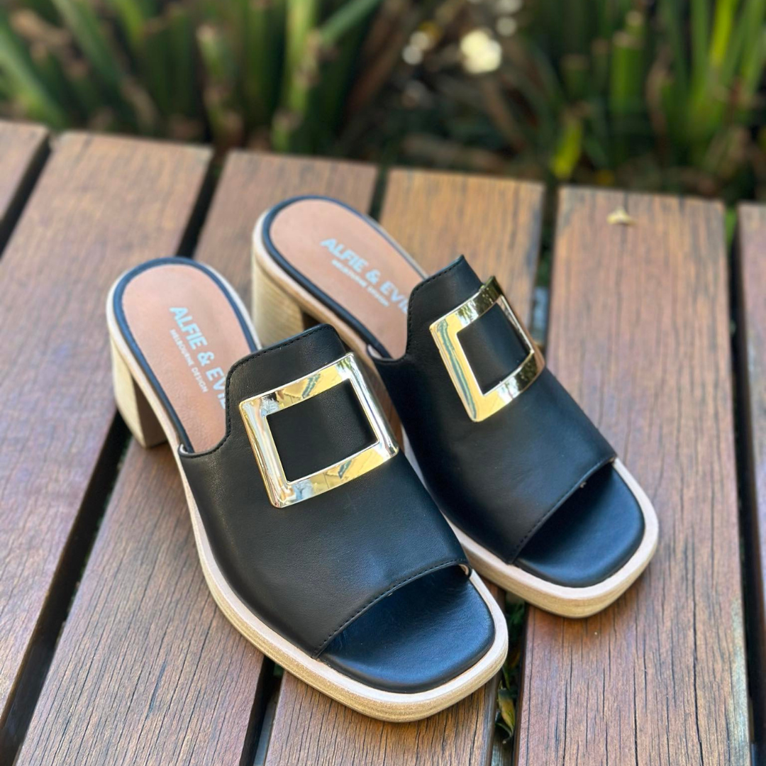 black slip on heels with gold trim