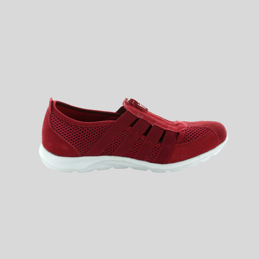 Red leather walking shoes with white sole. Zip  access for ease of putting on.