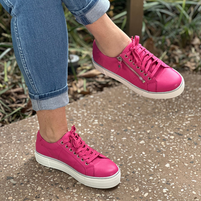 Hot pink leather sneakers with side zip
