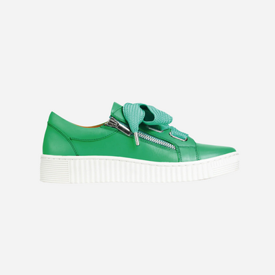 green sneakers with side zip and chunky lace with a white sole