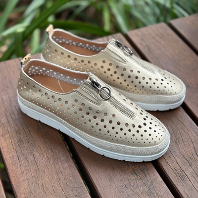 gold sneakers by bay lane