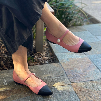 Pink and Black Mary Jane style flats