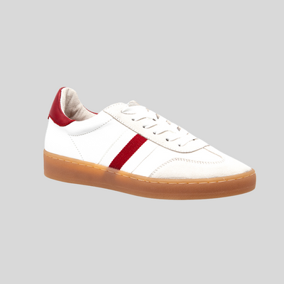 white sneakers with red stripe trim gum sole