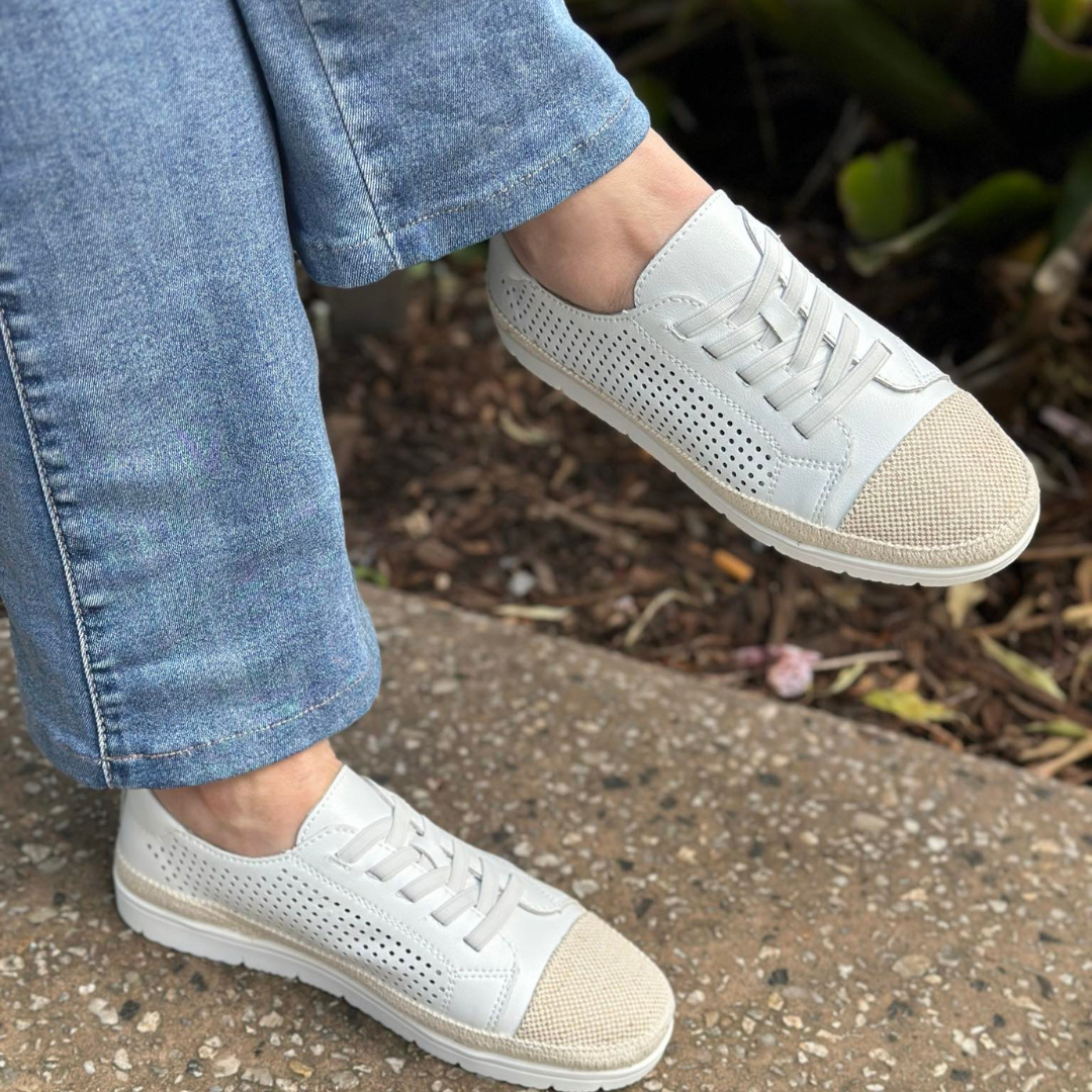 white sneakers with beige trims