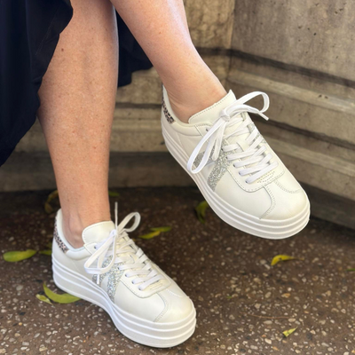 white silver sneakers