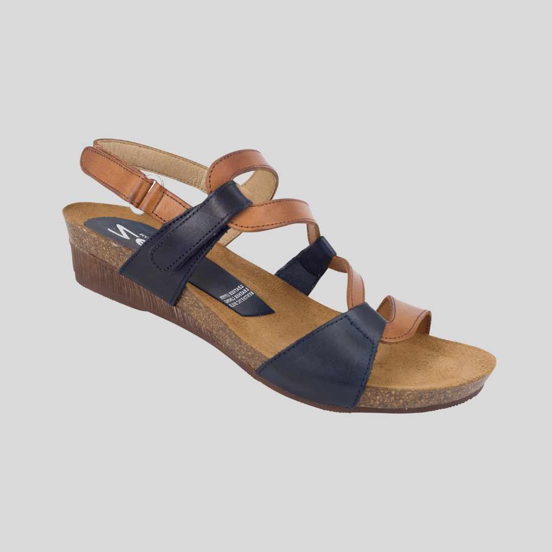 Navy and Tan Multi low wedge sandals with velcro straps to adjust the fit.