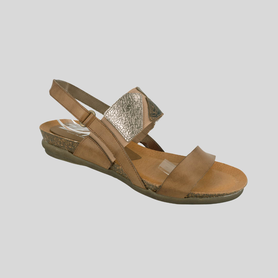 natural leather sandals with mettalic trim on instep strap. Velcro at heel. Leather footbed