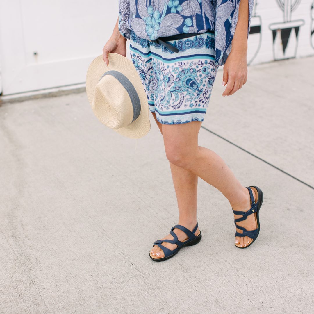 lifestyle image of navy sandal miami revere