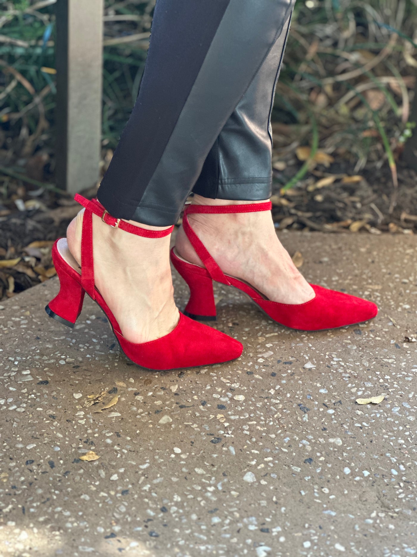 Red suede heels by Mollini Shoes