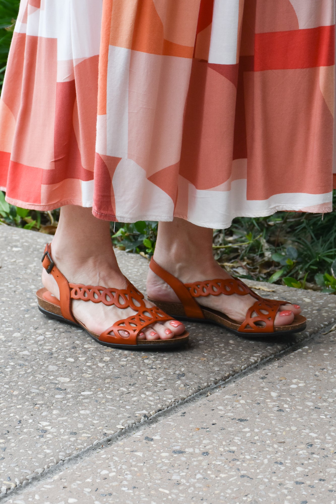 Women's orange sandal lifestyle by Zeta Shoes