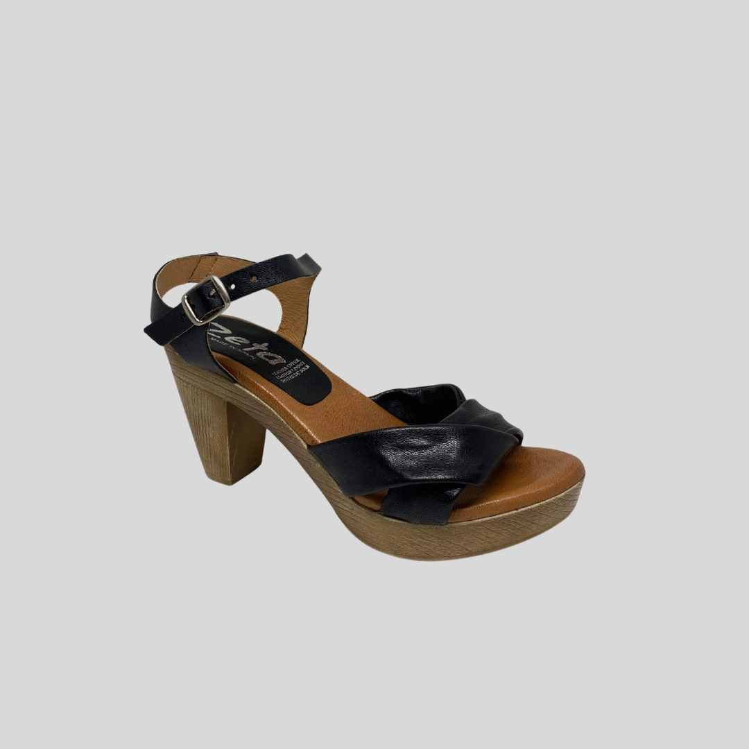 Black heels on a platform cushioned sole